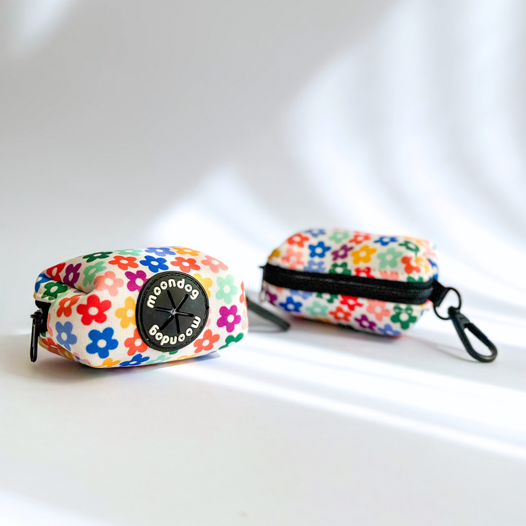 "Spring" poop bag holder 